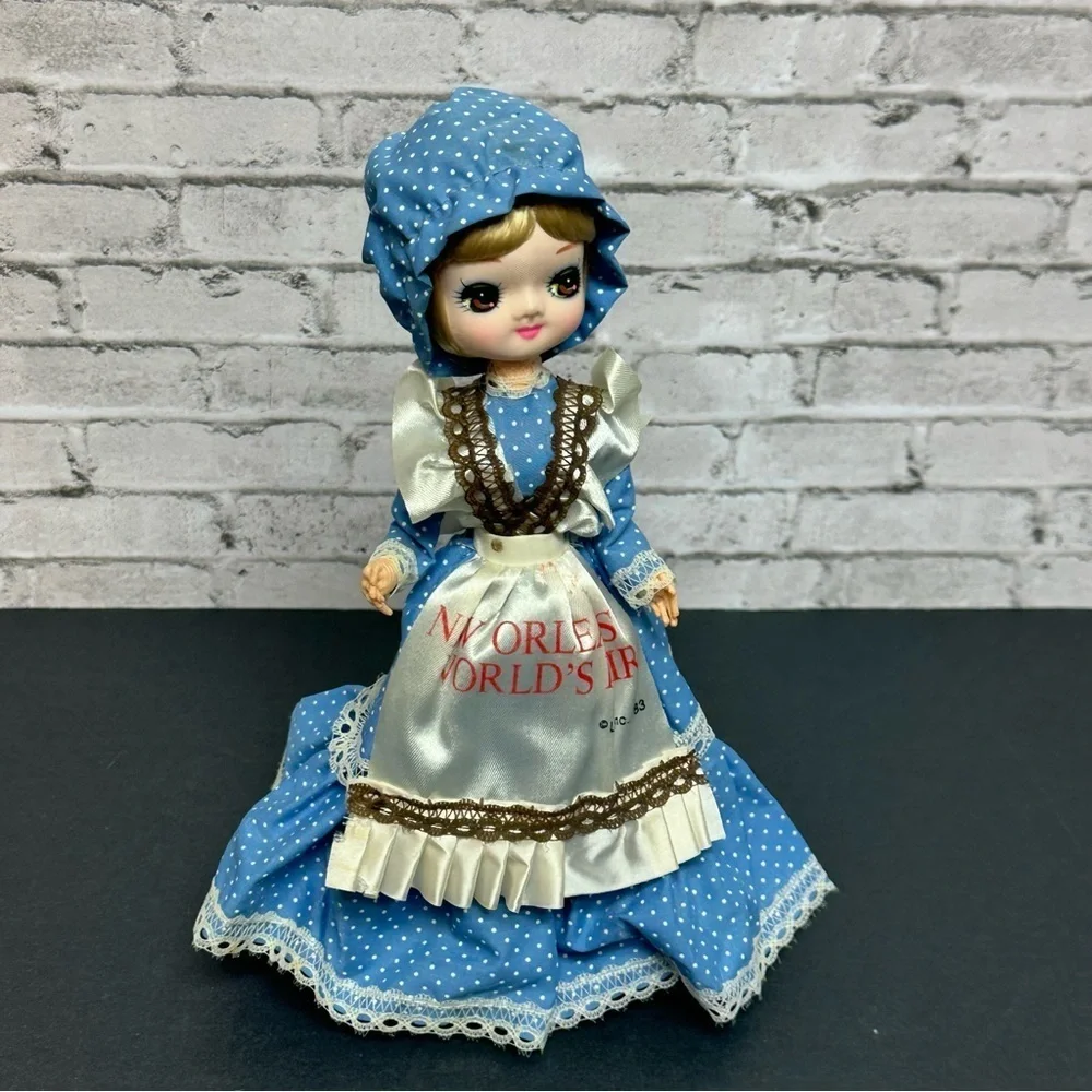 Vintage 1983 New Orleans World's Fair Big Eyes Doll Dress Bonnet Stand 10 in.